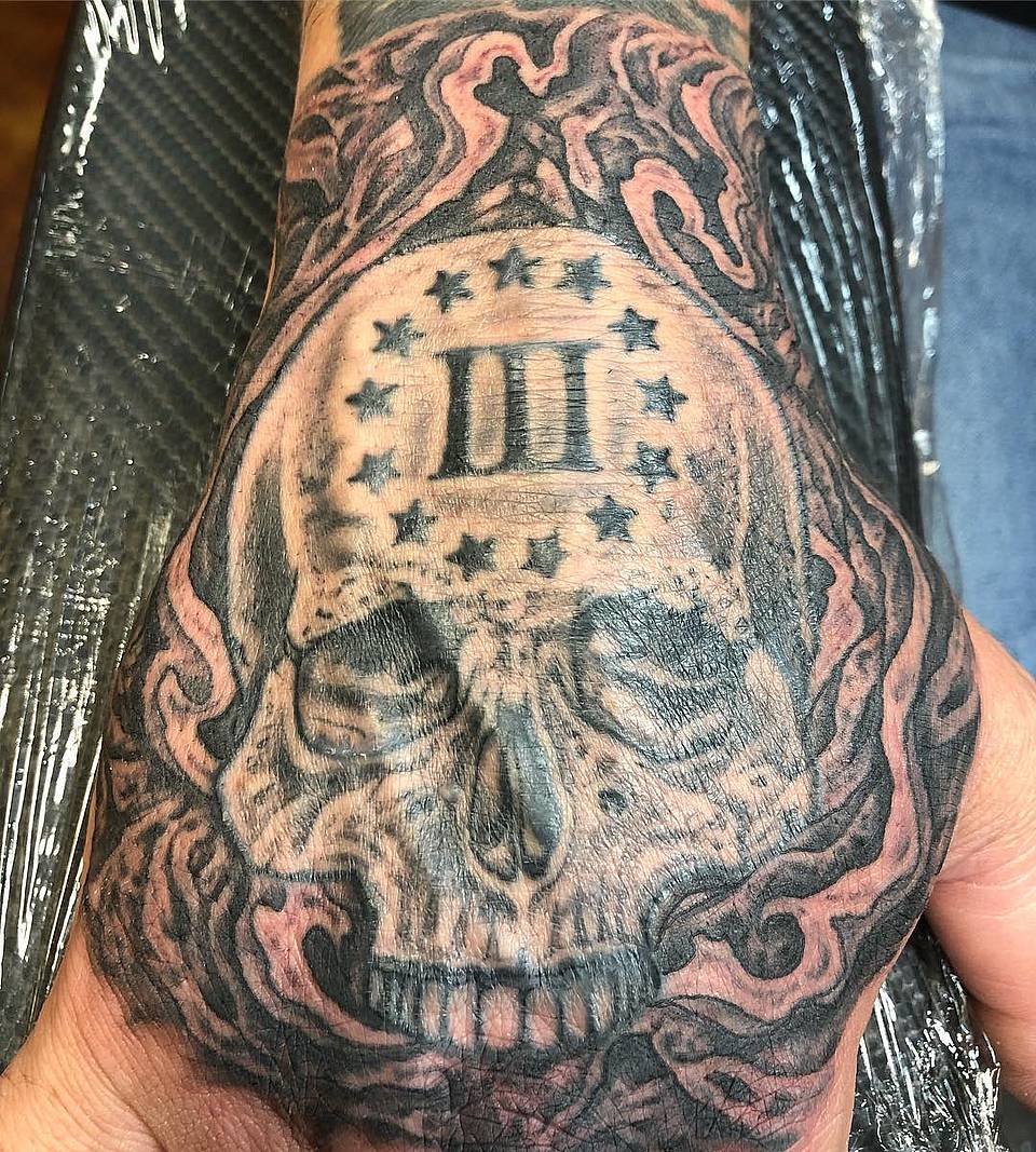 Skull with III and Ring of Stars