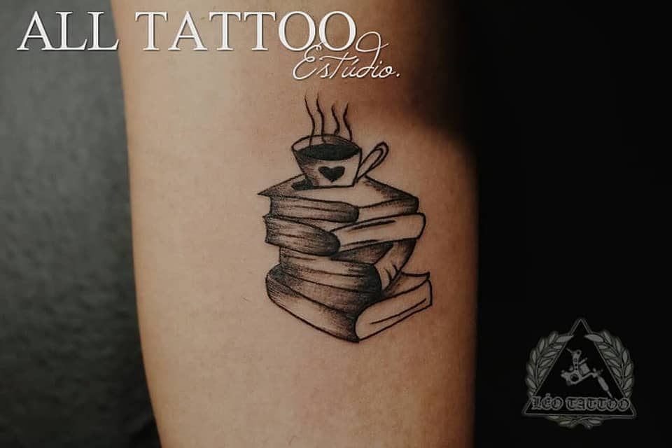 Stacked Books and Coffee Cup