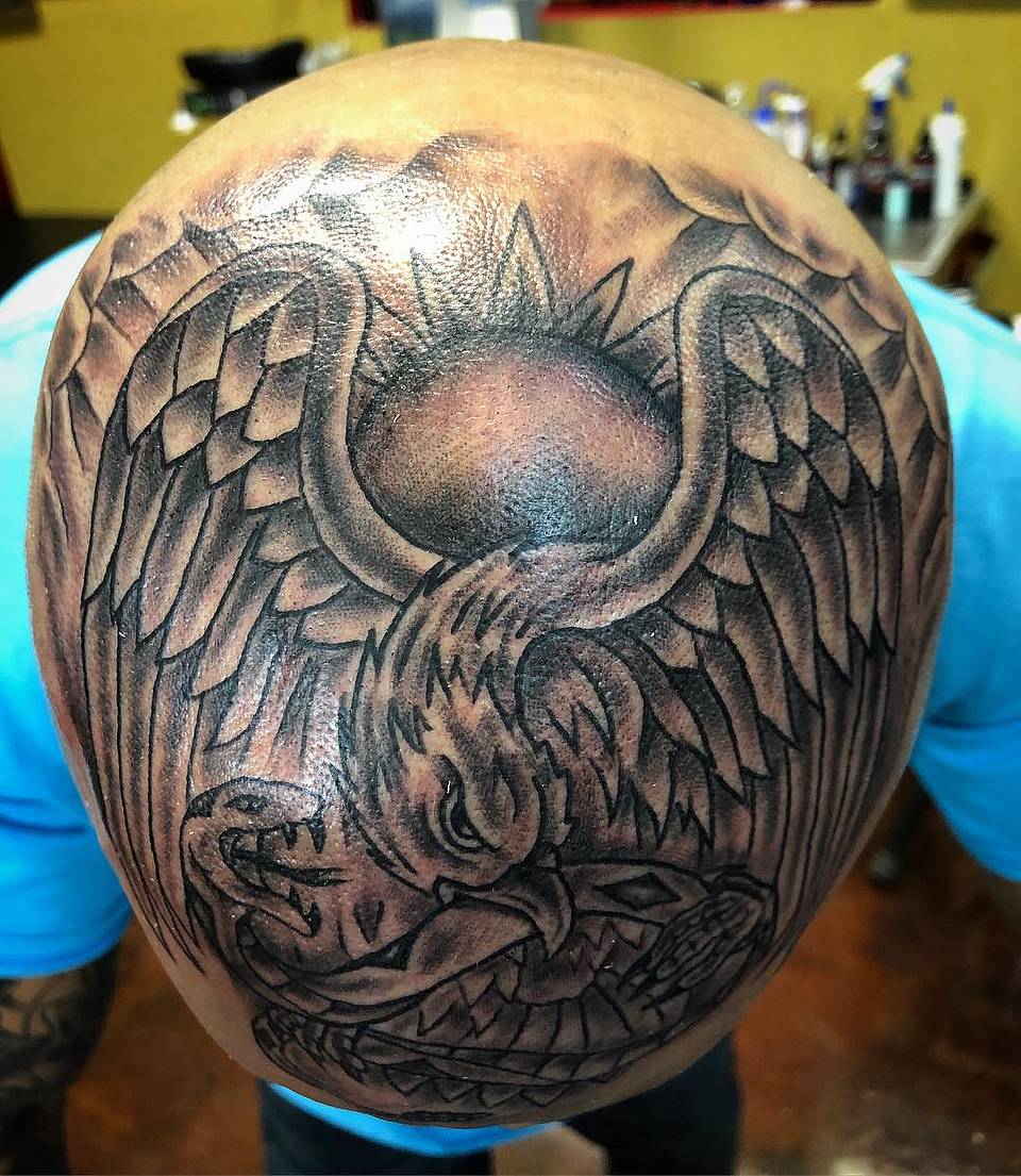 Sun-Crowned Eagle and Serpent