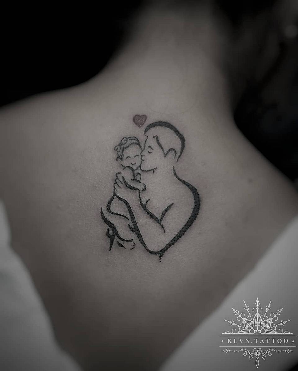 Tender Father and Baby Embrace