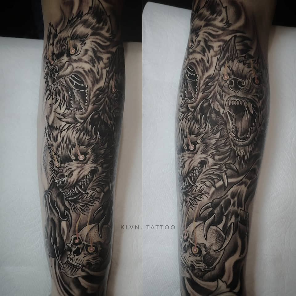 Triad of Wolves with Skull