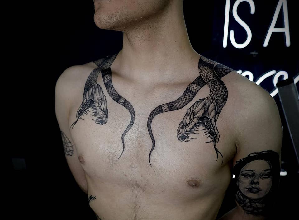 Twin Serpents Across the Collarbones