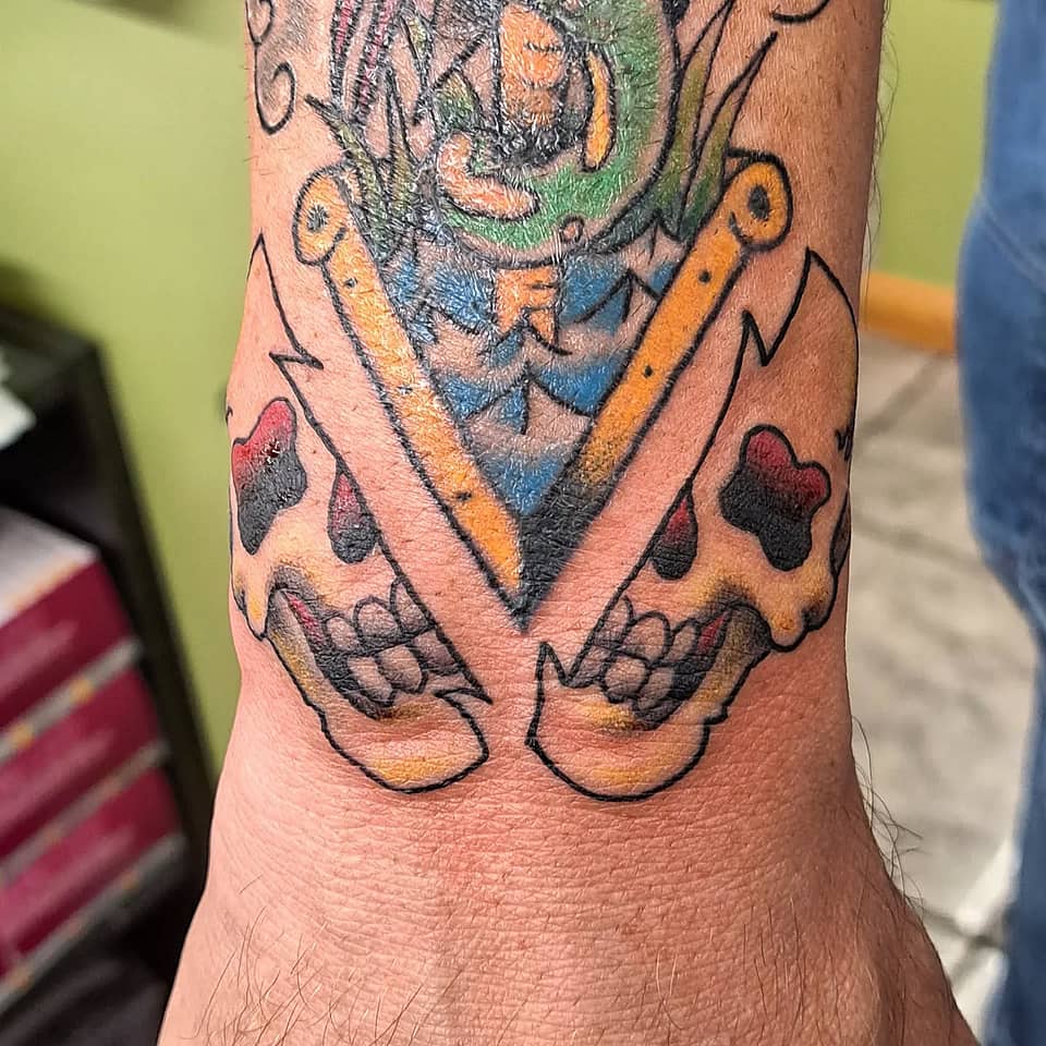 Twin Skulls and Square-and-Compasses