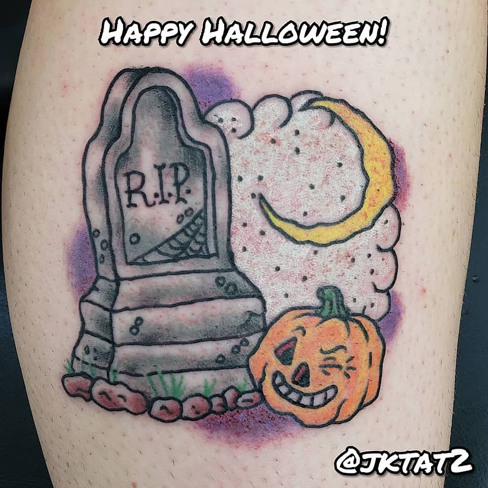 Winking Jack-O'-Lantern by the Grave